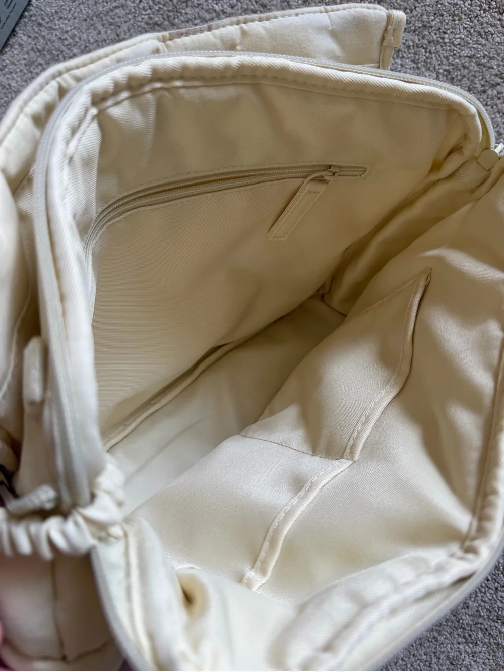 Beis x Elsa - Quilted Diaper Clutch in cream.